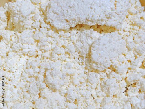 Close-up texture of fresh Romanian cottage cheese