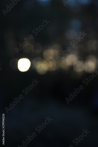 Bild auf Leinwand Abstract Bokeh Lights in Dark Background - Dreamy Out-of-Focus Circles