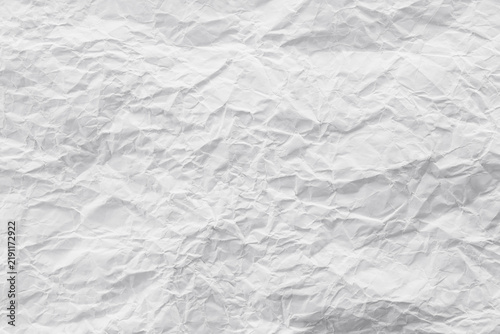 Texture crease of white paper for template wallpaper. wrinkle of gray paper crumpled background.