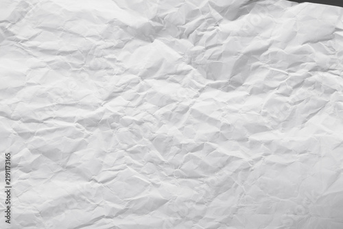 Texture crease of white paper for template wallpaper. wrinkle of gray paper crumpled background.