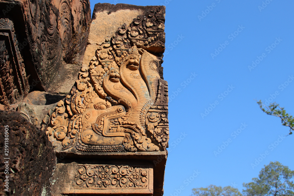 Fototapeta premium in a ruined buddhist and hindu khmer temple (banteay srei) in angkor in siem reap in cambodia 