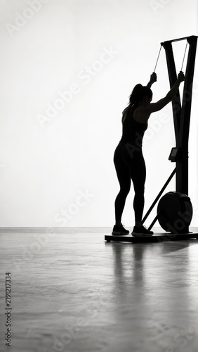 Silhouette of Woman on Ski Machine in Functional Fitness Race