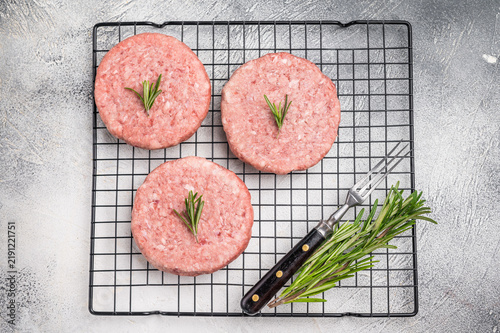 Konstfotografi Close up of a juicy raw meat patty cutlet, ideal for crafting mouthwatering sandwiches and savory dishes