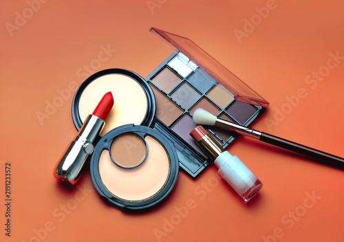 Cosmetics set closeup, makeup items collection, beauty products arrangement.Shadows,lipstick,powders.