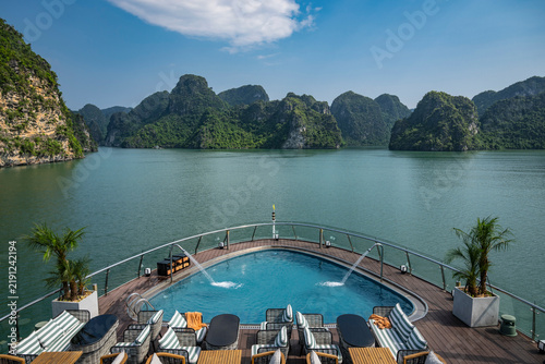 Luxury cruise ship with pool deck in Ha Long Bay Vietnam