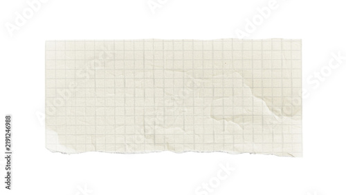 Torn beige graph paper fragment with grid lines, isolated on transparent background