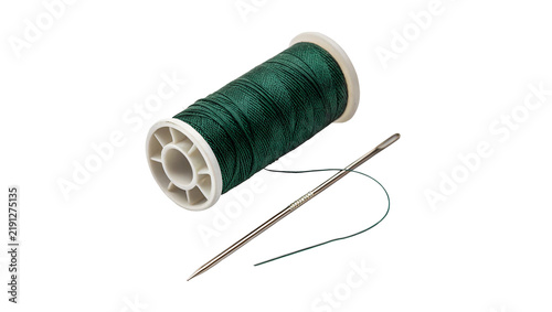Принти на полотні Green sewing thread spool with a steel needle isolated on transparent background