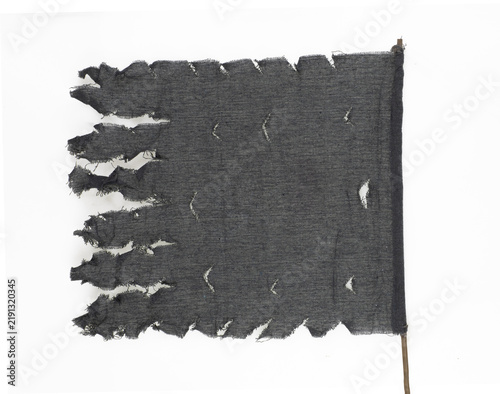 Black tattered pirate flag isolated on a white background