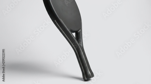 Close-up of a sleek black padel racket mockup, elegantly displayed vertically on a clean white background, highlighting its ergonomic handle and carbon fiber texture for sporting gear advertisements.