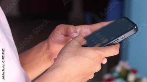 close up of women hand holding smart phone 