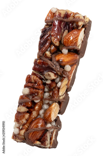 Bar with peanuts, hazelnuts, caramel and chocolate on a white background. View from above. Nut bar isolate. Sugar