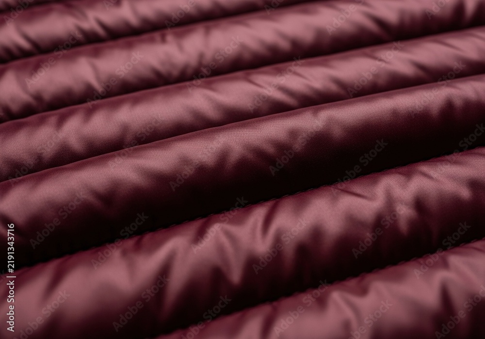 Obraz premium Abstract Background of Quilted Burgundy Fabric Texture.