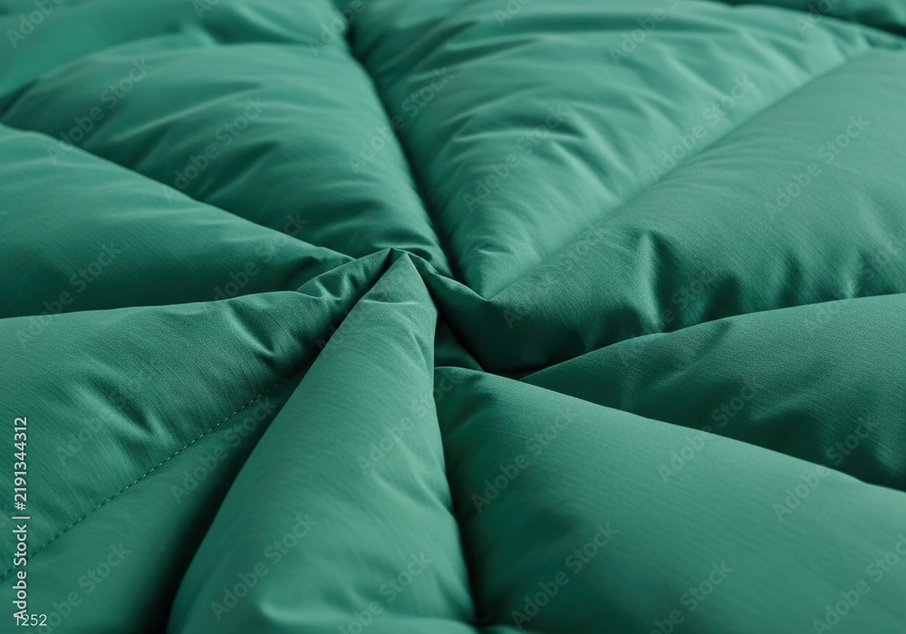 Obraz premium Abstract Close Up of Soft Emerald Green Fabric Quilted Texture.