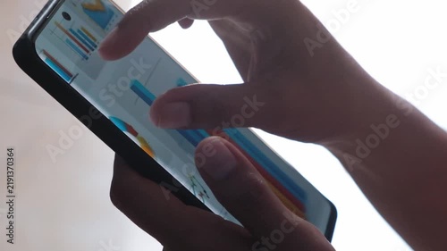 close up of women hand holding smart phone 