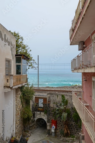 Konstfotografi Scenic narrow street with sea view in Pizzo Calabria Italy