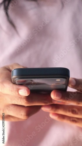 close up of women hand holding smart phone 