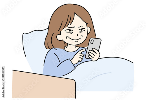 Japanese woman smiling slyly in bed while plotting to call in sick or fake an illness using her smartphone.