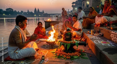 Hindu Ritual Ceremony on Riverbank at Sunset.
