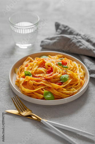 Homemade Tagliatelle Pasta with Tomato Sauce, Basil and Parmesan