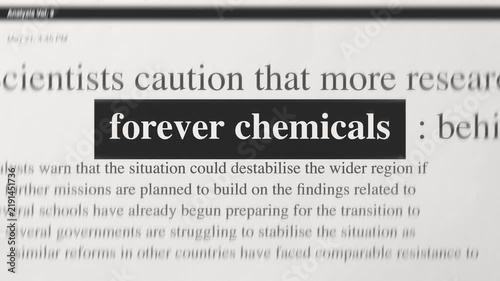 Forever chemicals picked out in bold in a close up news article, text on textured paper. PFAS pollution, contamination and public health coverage