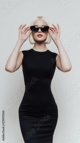 Glamorous Blonde Woman Model Portrait in Black Dress and Sunglasses Fictional Character Created by Generative AI.