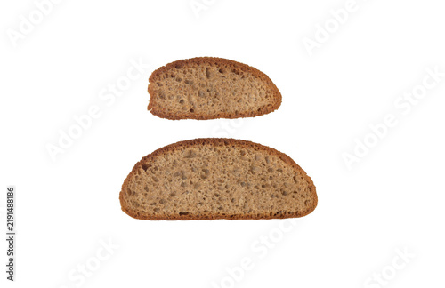 Foto Two rustic bread slices with porous crumb and baked crust, top view on a transpa