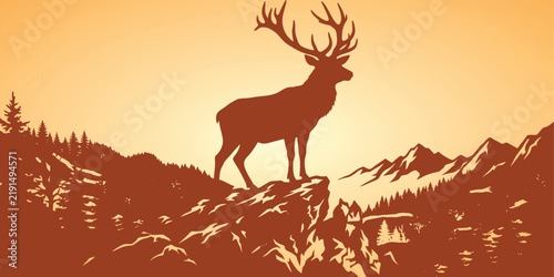 Majestic stag standing on a rocky mountain cliff at sunset with mountain peak
