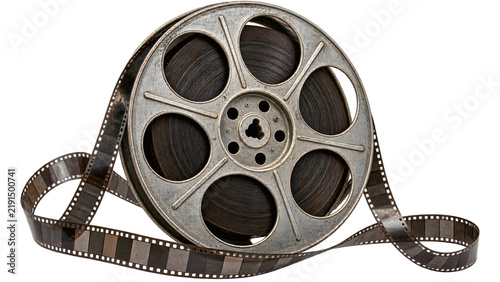 An old film reel with filmstrip unwound, showcasing classic cinema