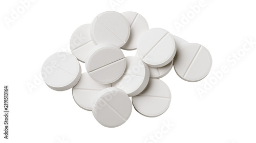 Obraz na plátne Pile of round white medicinal tablets with a center score line