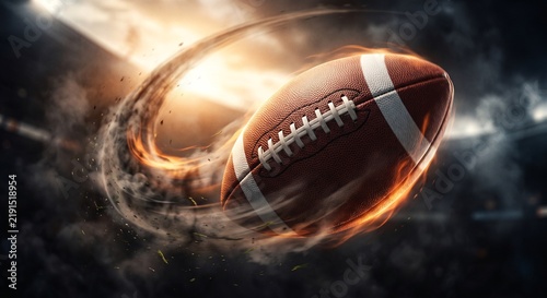 American football flying through the air with a motion blur effect