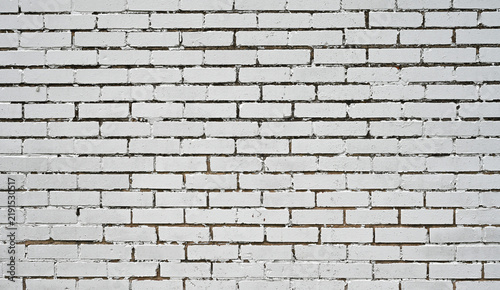 Canvastavla White painted brick and mortar wall showing flat smooth brick faces with cracked
