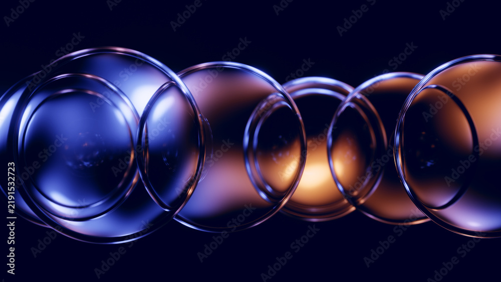 Obraz premium Row of glass rings with elegant blue copper reflections.