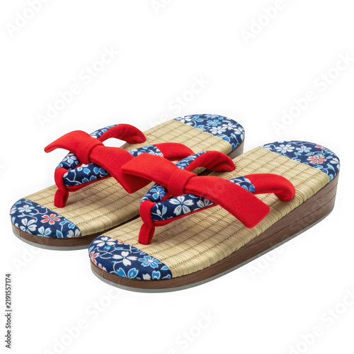 Colorful traditional Japanese geta sandals on a neutral surface