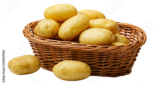 фотографія Fresh raw yellow potatoes in a woven wicker basket