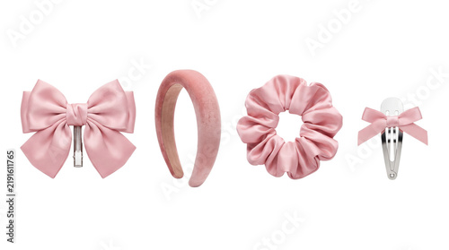 Fotografie Pink satin hair accessories and velvet headband isolated