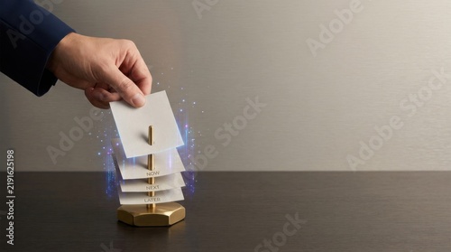 Person holding piece of paper representing task prioritization and handling incoming requests for efficient processing