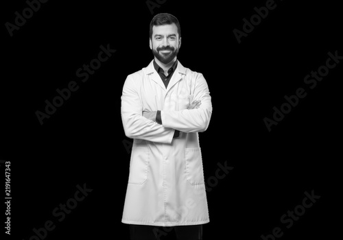 Confident bearded male doctor wearing a white lab coat isolated on transparent background