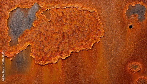 Corrosion Texture: A close-up view reveals the intricate patterns and textures of rust forming on metal, showcasing the beauty of decay and oxidation.