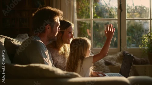 Family Spending Time Together by a Sunlit Window at Home

