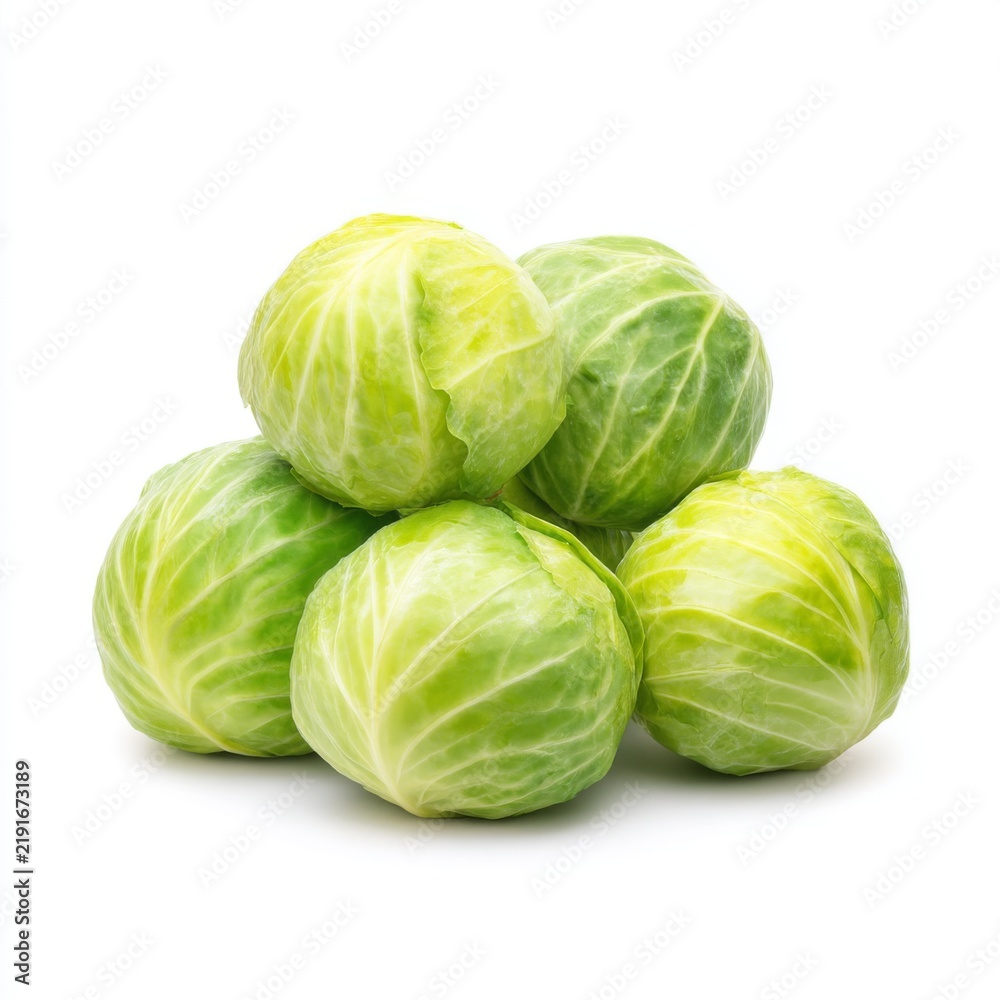Fototapeta premium Fresh Green Cabbage Heads Stacked Together on a White Background for Culinary and Health Purposes