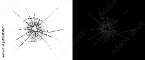 Shattered glass texture with bullet hole, broken window cracks on black and white background, realistic damage overlay for photo editing