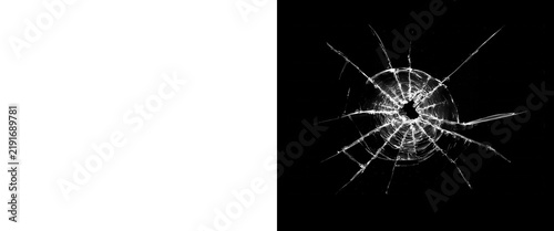 Shattered glass texture on black background, broken window bullet hole effect, cracked glass overlay for photo editing