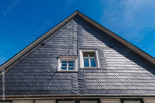 Bild auf Leinwand Close-Up of Slate-Shingled Gable House in Freudenberg Germany