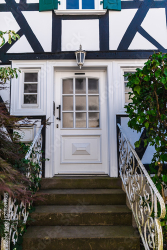 White-and-Blue Half-Timbered House Entrance in Freudenberg Germany