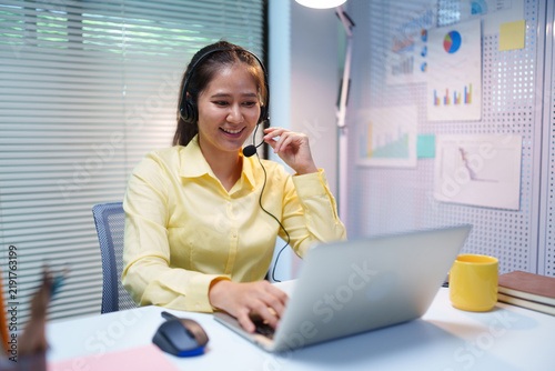 Obraz na plátně Customer Service Call Center Agent Providing Support and Client Assistance