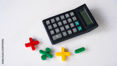 Canvastavla Black Calculator Displayed with Colorful Mathematical Symbols Concept of Financi