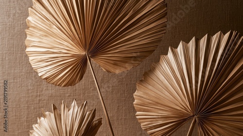 Rustic boho earth tone backdrop watercolor concept. Decorative textured palm leaves artwork on a brown woven background.