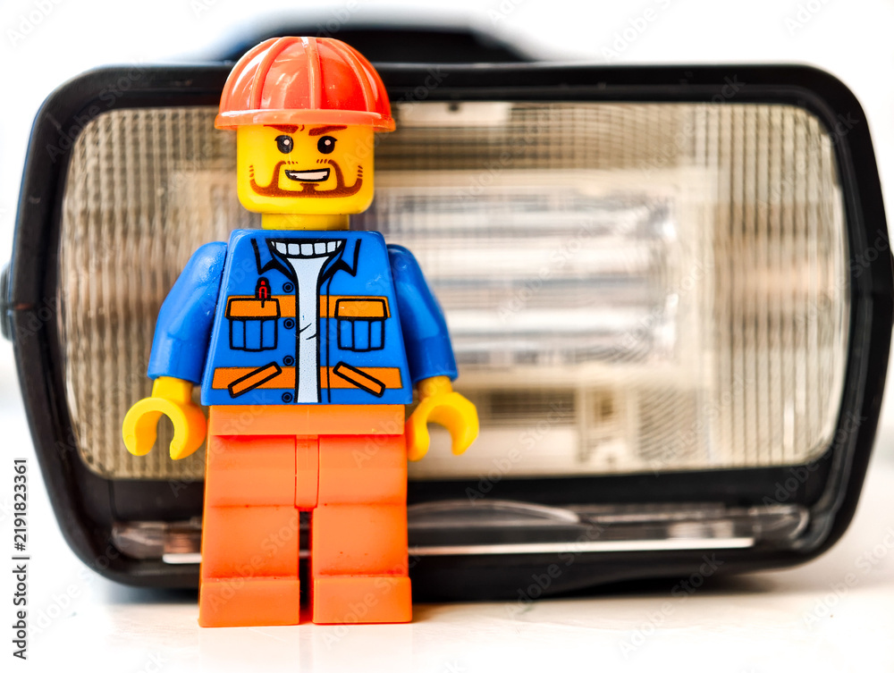 Obraz premium Russia, St. Petersburg, August 8, 2020. Lego man stands next to the headlight