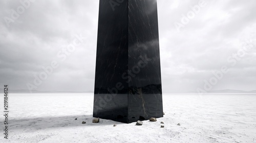 Black Marble Monolith Standing in a White Salt Flat Desert