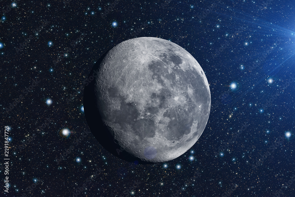 Fototapeta premium A stunning, highly detailed, three-quarter lit Moon in deep space, set against a dense field of distant stars. Elements of this image furnished by NASA
